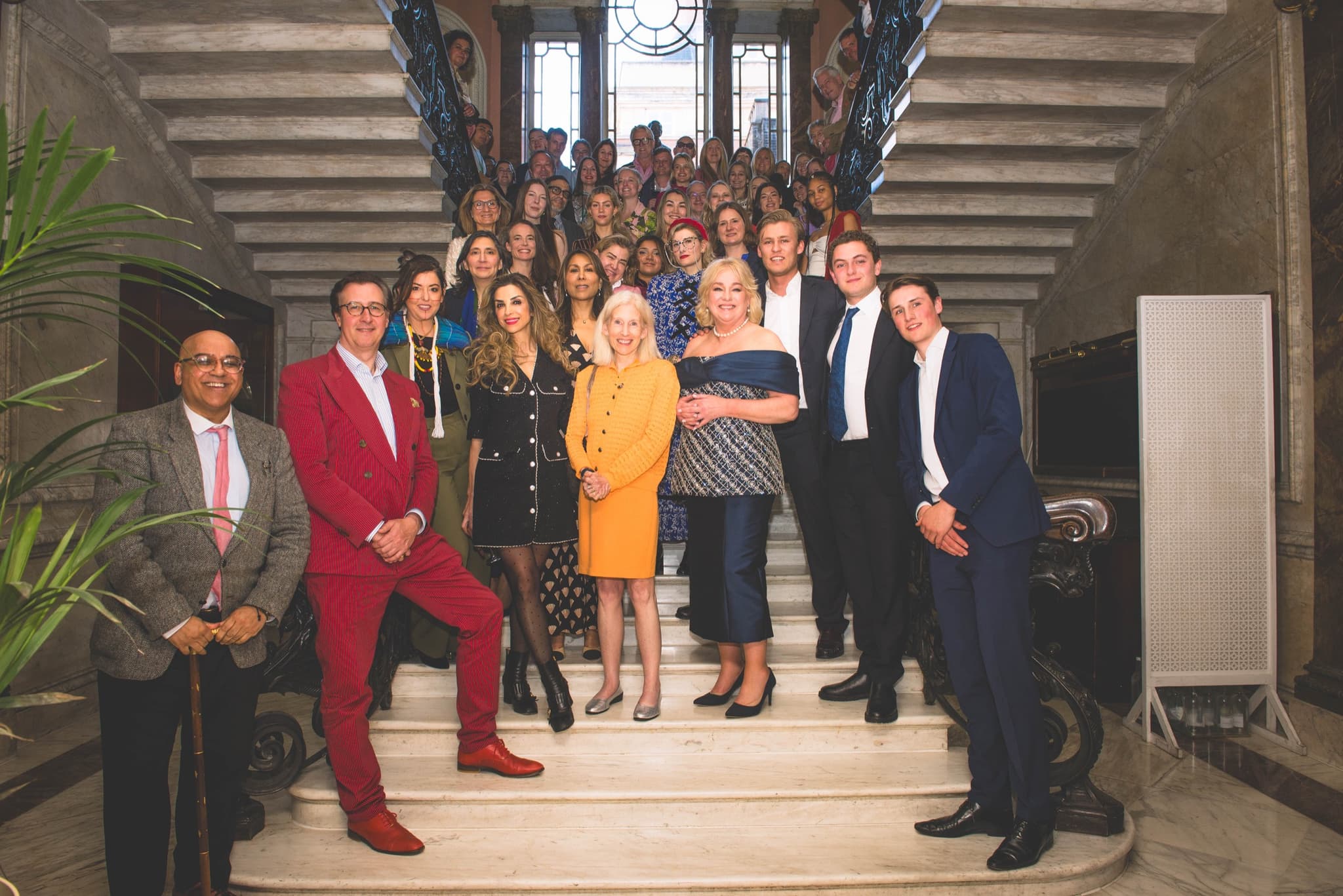 The Salon gathered on the staircase at Dartmouth House