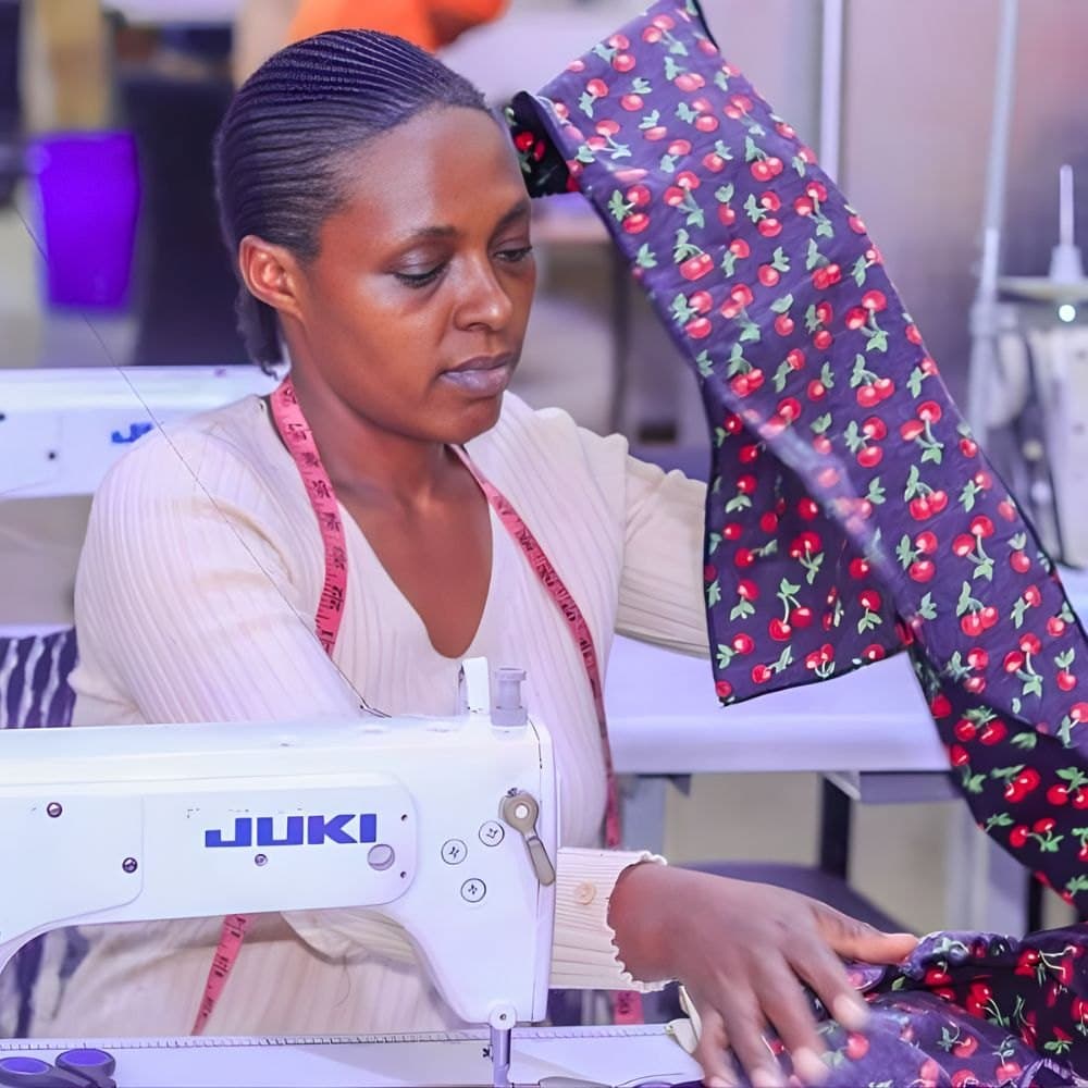 A tailor at work in a Kenyan vocational training workshop